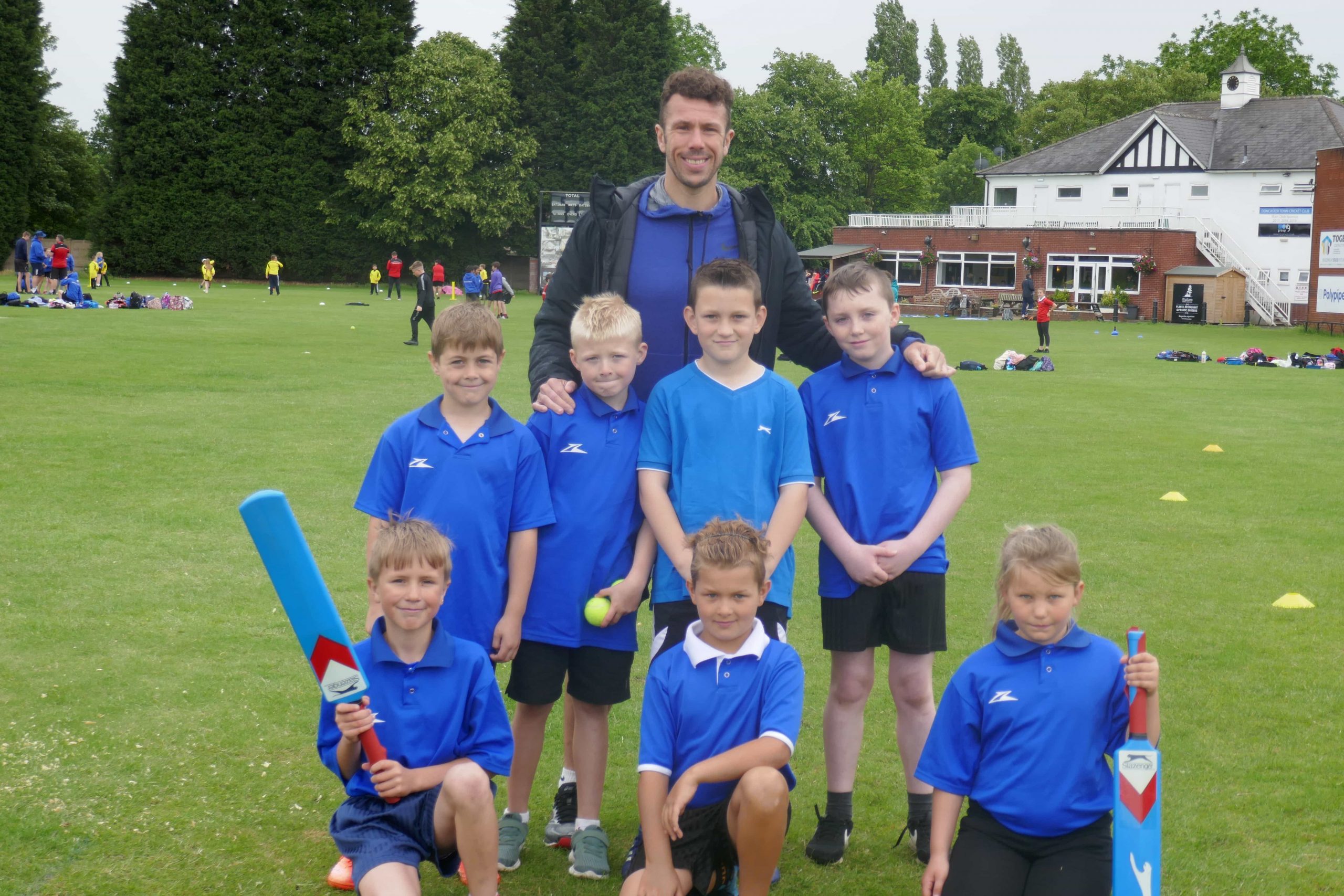 Brad Johnston with students at another School Games event